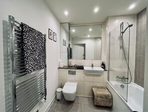 Hair dryer, towels, soap, shampoo