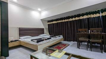 Deluxe Room, City View | Breakfast area | Daily continental breakfast (INR 100 per person)