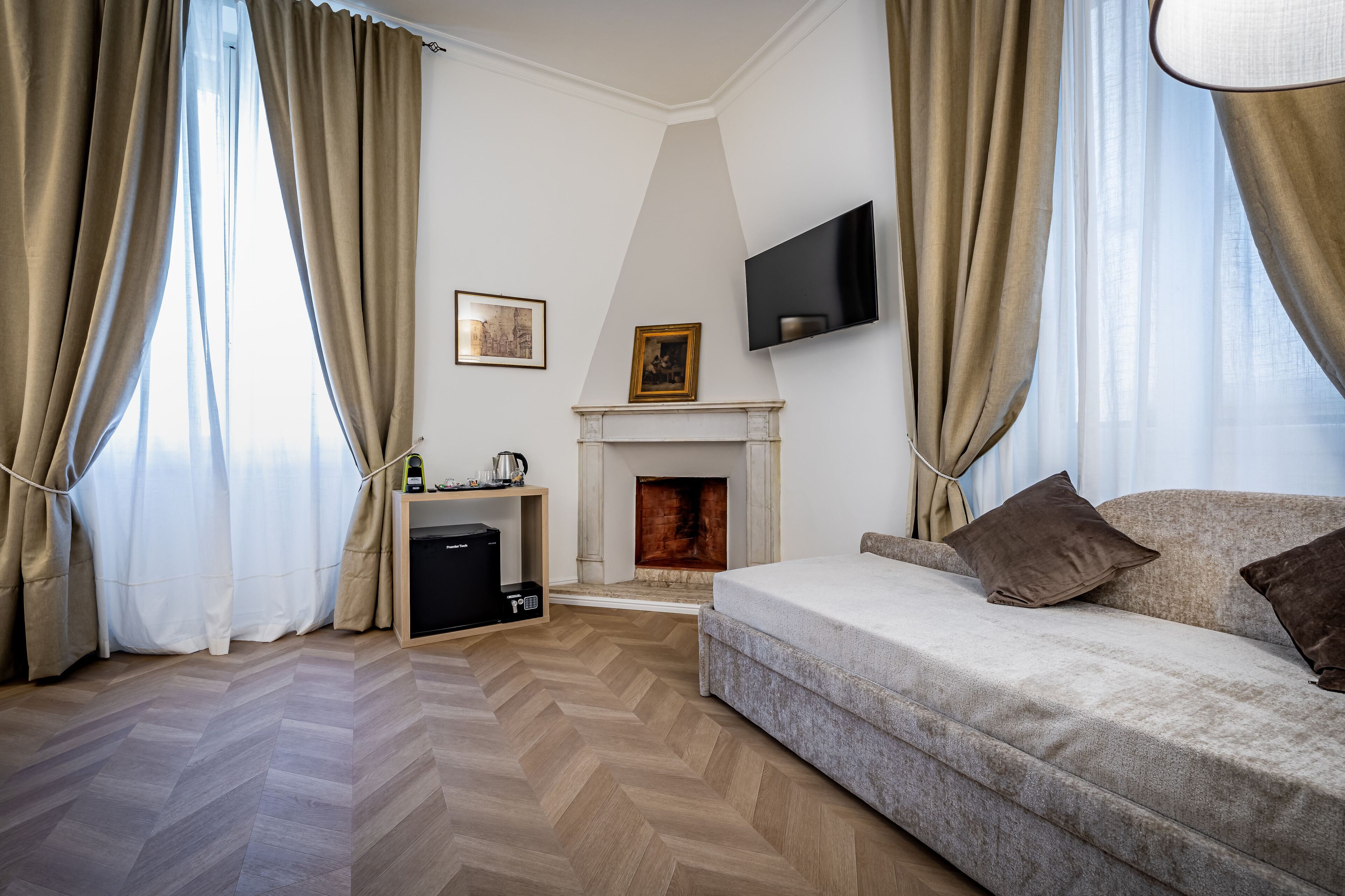 Comfort Triple Room | Free minibar, in-room safe, laptop workspace, iron/ironing board