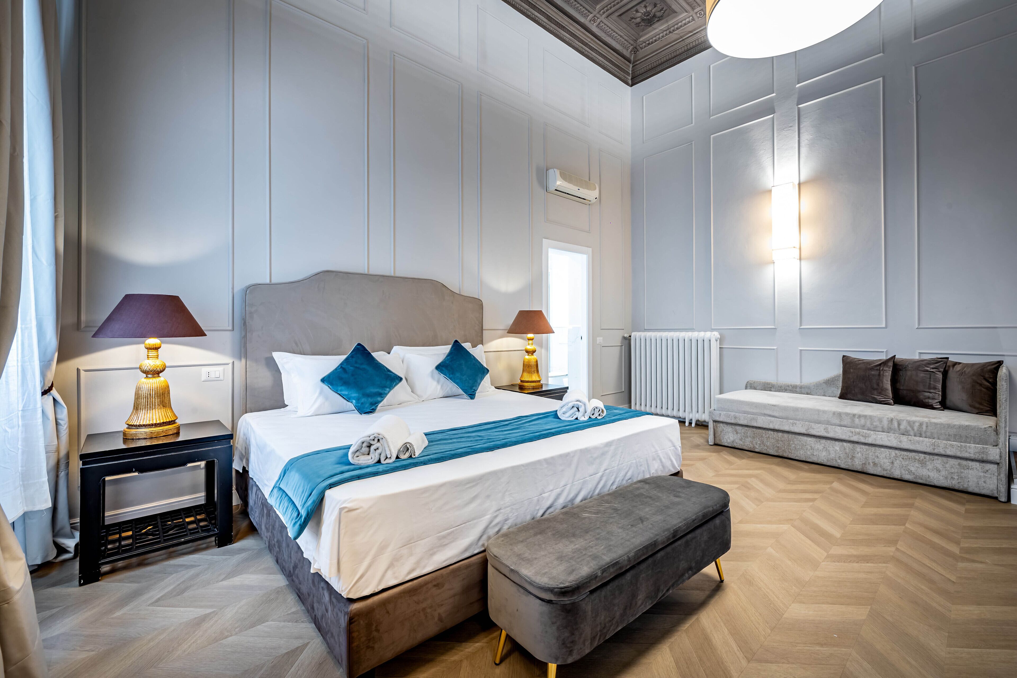 Deluxe Quadruple Room | Free minibar, in-room safe, laptop workspace, iron/ironing board