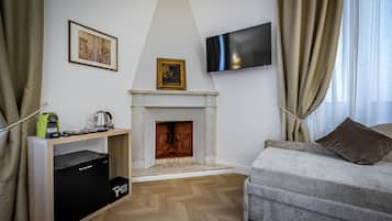 Comfort Triple Room | Free minibar, in-room safe, laptop workspace, iron/ironing board