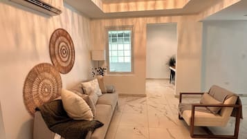Apartment, 2 Bedrooms, Corner | Living area | 40-inch flat-screen TV with digital channels, streaming services