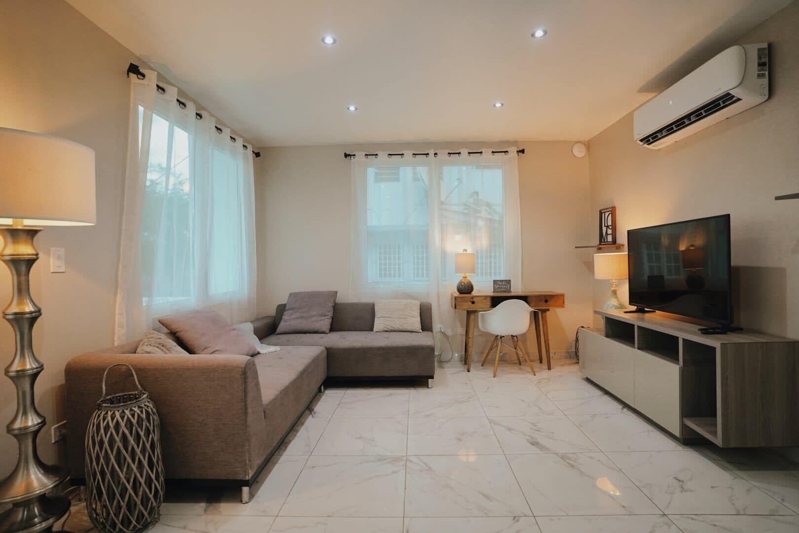 Apartment, 3 Bedrooms | Living area | 40-inch flat-screen TV with digital channels, streaming services