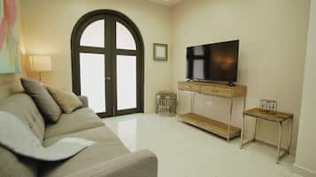 Apartment, 2 Bedrooms, Ground Floor | Living area | 40-inch flat-screen TV with digital channels, streaming services