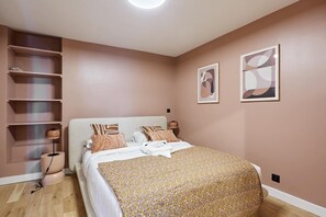 Apartment | Laptop workspace, iron/ironing board, bed sheets