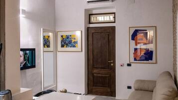 Appartamento Deluxe | Area soggiorno | TV