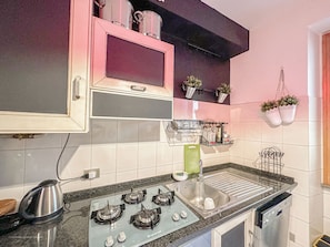 Fridge, stovetop, coffee/tea maker, cookware/dishes/utensils