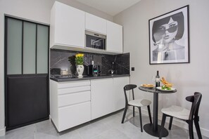 Apartment | Private kitchen | Fridge, microwave, stovetop, coffee/tea maker