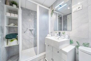 Hair dryer, bidet, towels, soap