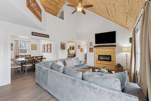 Smart TV, fireplace, books