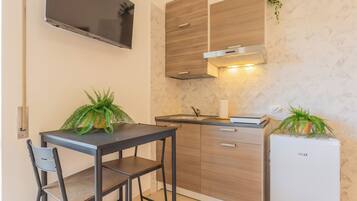 Dreibettzimmer, Balkon | Essbereich im Zimmer