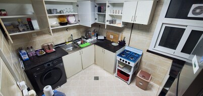 Homely Hostel - Spacious and clean bedspace in prime location on Al Wahda Street