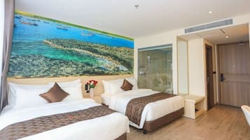 Deluxe Twin Room, Ocean View | Desk, laptop workspace, blackout drapes, free WiFi