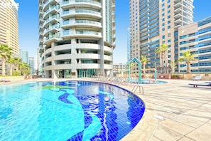 Indoor pool, outdoor pool - bnbme | Damac Waves Tower | 3 + Maids (Dubai)