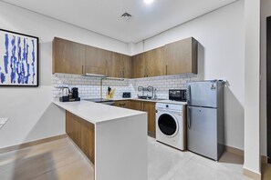 Appartement Prestige, 1 très grand lit (117) | Cuisine privée | Réfrigérateur, cafetière-théière, bouilloire électrique, grille-pain