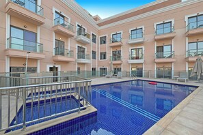 Outdoor pool, pool umbrellas, pool loungers