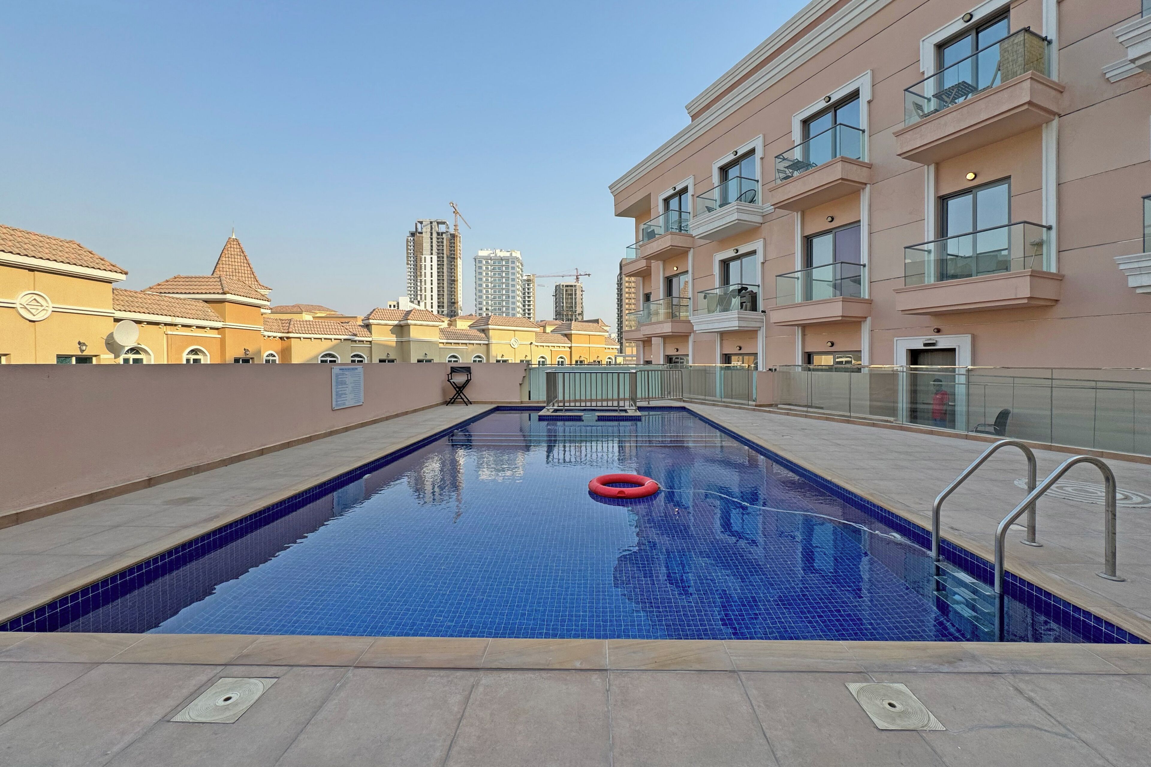 Outdoor pool, pool umbrellas, sun loungers