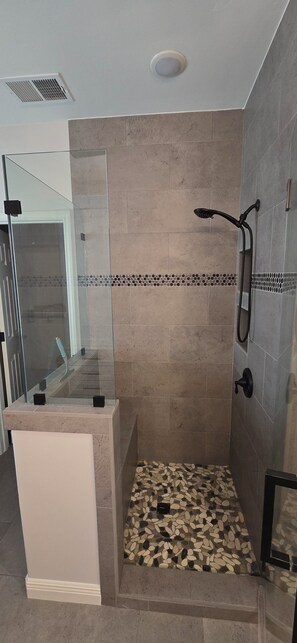 Jetted tub, hair dryer, towels, soap