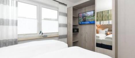 2 habitaciones, wifi gratis y ropa de cama