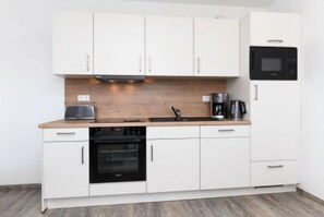 Réfrigérateur, micro-ondes, four, lave-vaisselle