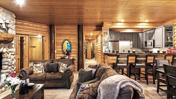 Condo (2 Bedrooms) | Living room | 32-inch TV with satellite channels, DVD player