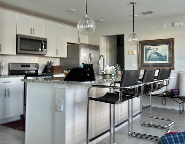 Huis, Meerdere bedden, terras, uitzicht op tuin (Island Time) | Privékeuken | Een koelkast, een microgolfoven, een oven, een kookplaat