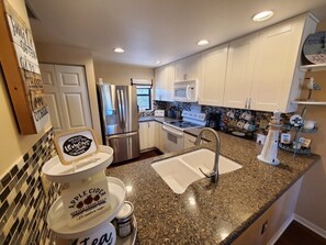 Condo, Multiple Beds, Balcony, Garden View (Ocean Village Club I35) | Private kitchen | Fridge, microwave, oven, stovetop - Ocean Village Club I35 (St. Augustine)