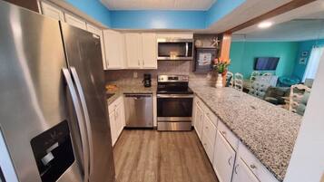 Condo, Multiple Beds, Balcony, Garden View (Pelican Inlet C217) | Private kitchen | Fridge, microwave, oven, stovetop