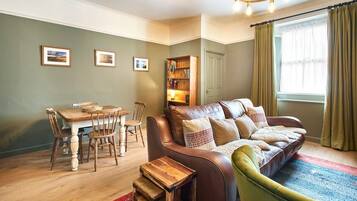 TV, fireplace, books