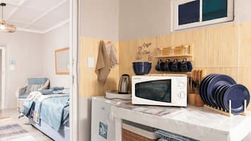 Basic Quadruple Room, Garden View | Free WiFi