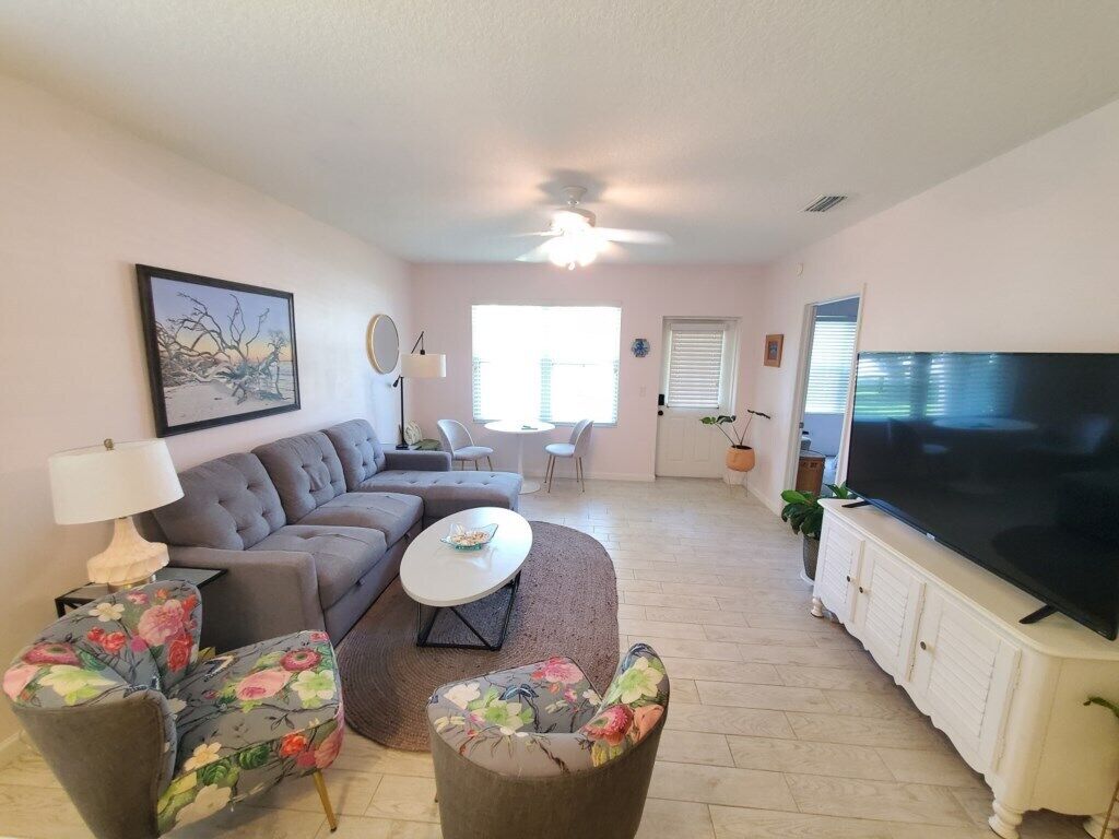 Condo, Multiple Beds, Patio, Garden View (E Street Retreat) | Living area | 42-inch flat-screen TV with digital channels