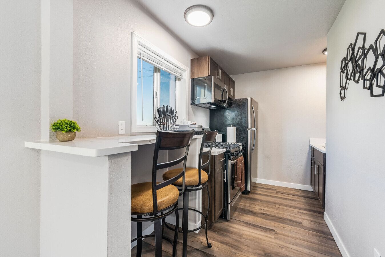 Refrigerador, microondas, horno y parrilla de estufa 