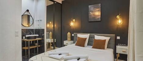 Apartment | Laptop workspace, iron/ironing board, bed sheets