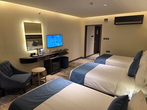 Standaard driepersoonskamer, 3 eenpersoonsbedden | Een minibar, gratis wifi, beddengoed