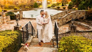 A couple standing on a stone bridge with a fountain in the background. - The Grand Estate in Freeport PA just NE of Pittsburgh Pa Private Pool (Freeport)