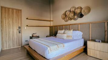 A modern bedroom with a wooden bed, bedside tables, a wall-mounted light fixture, and a decorative wall art piece.