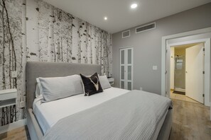 1 bedroom, desk, iron/ironing board, travel cot