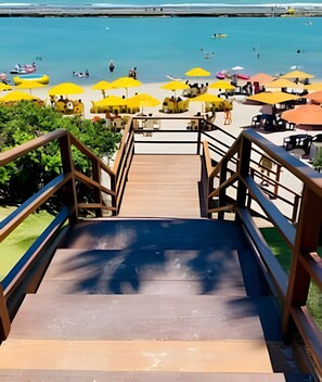 Apartment | Beach | On the beach, white sand, sun-loungers, beach umbrellas