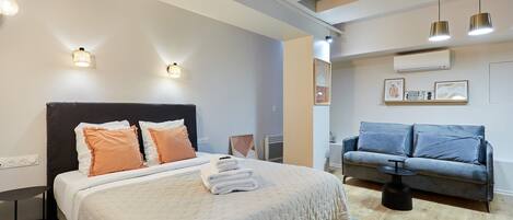 Apartment | Laptop workspace, iron/ironing board, bed sheets