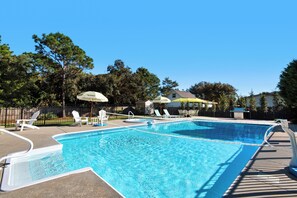 Outdoor pool, a heated pool - Private spacious resort, jumbo heated salt water pool/spa, game room, office (Navarre)