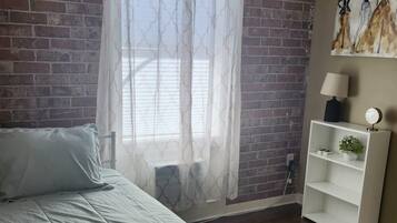 2 habitaciones y ropa de cama