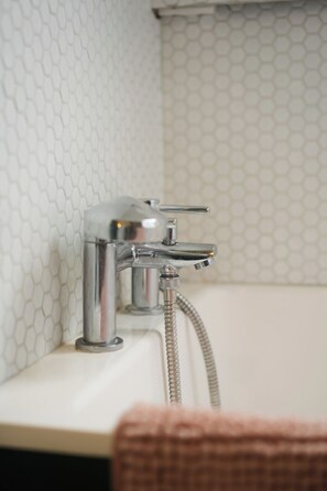 Shower, towels, soap, toilet paper