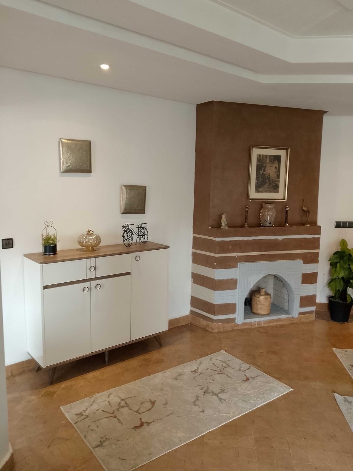 Familienapartment, Gartenblick | Wohnbereich | Kamin