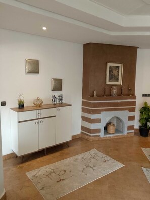 Appartement Familial, vue jardin | Coin séjour