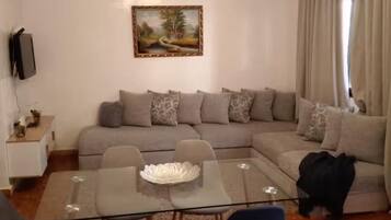 Appartement Familial, balcon, vue jardin | Coin séjour | Cheminée
