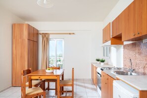 Classic Apartment, 2 Bedrooms, Kitchenette, Resort View | Private kitchen | Fridge, cookware/dishes/utensils - Mylos Apartments (Hersonissos)
