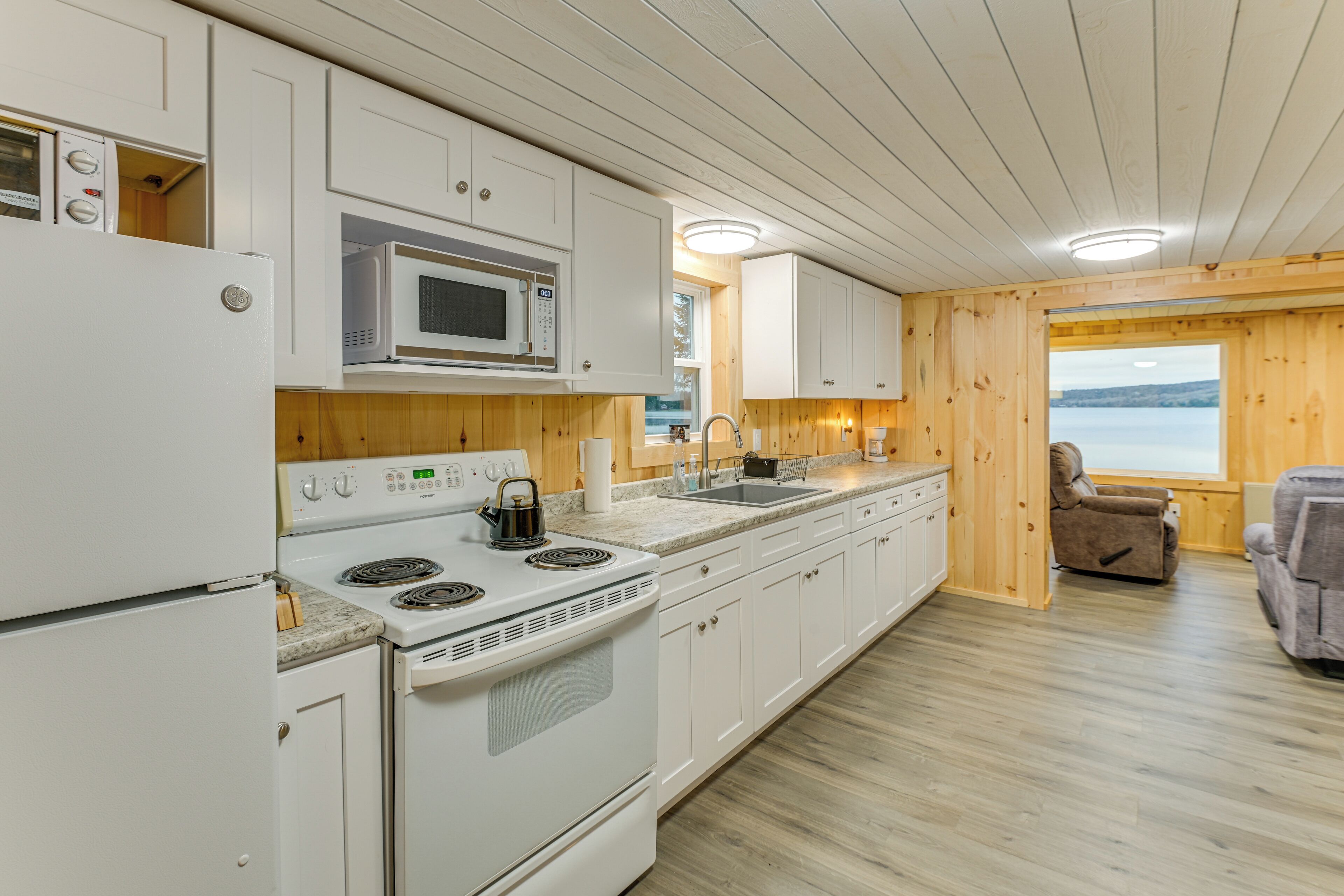 Fridge, microwave, stovetop, coffee/tea maker