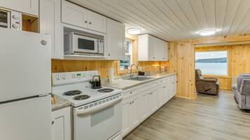 Fridge, microwave, stovetop, coffee/tea maker