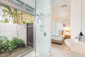 Shower, hair dryer, towels