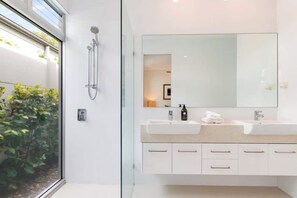 Shower, hair dryer, towels